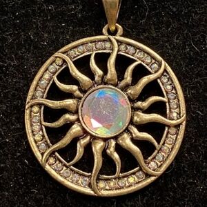 Radiant Gold Sunburst Necklace with Central Gem